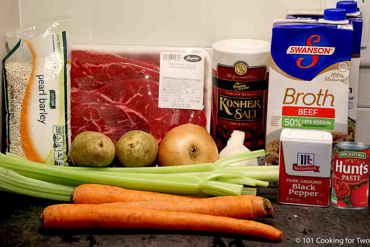 Chuck roast with barley and soup ingredients.