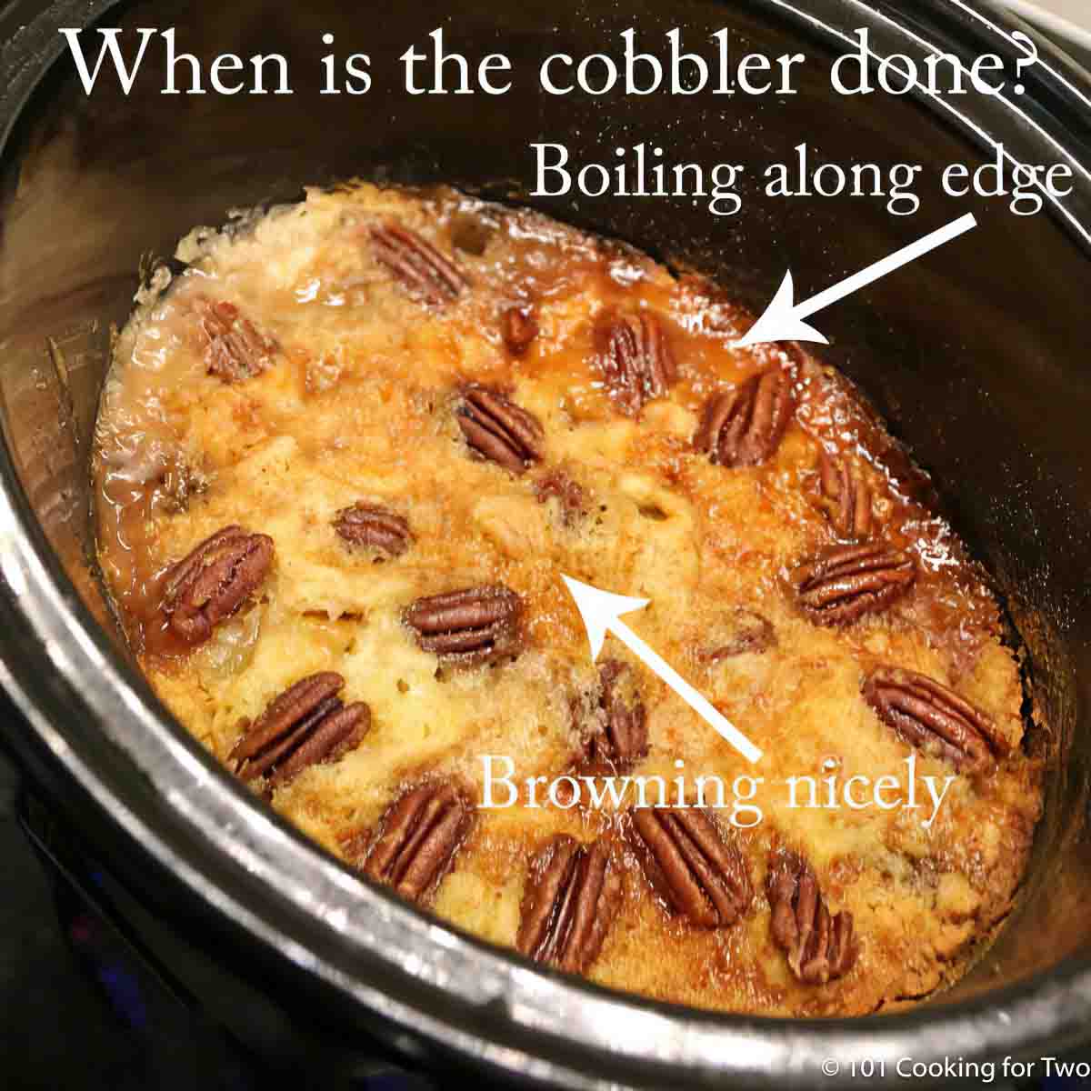 An example of cooked crock pot cobbler with browned top-labeled.