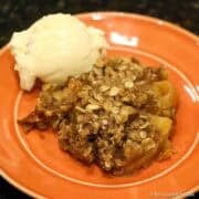 Apple crisp with ice cream.