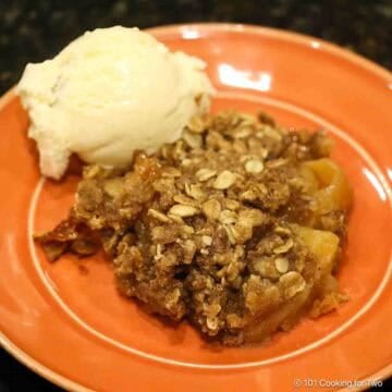 Apple crisp with ice cream.