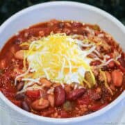 turkey chili with sour cream in a bowl.