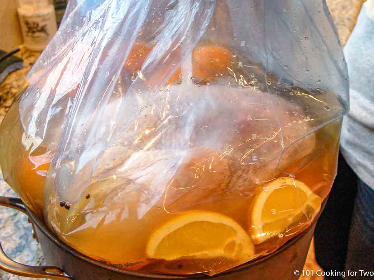 brining turkey in a large bag.