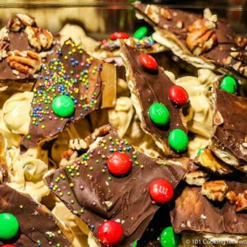 Pieces of Saltine Cracker Toffee with Christmas crack toppings.