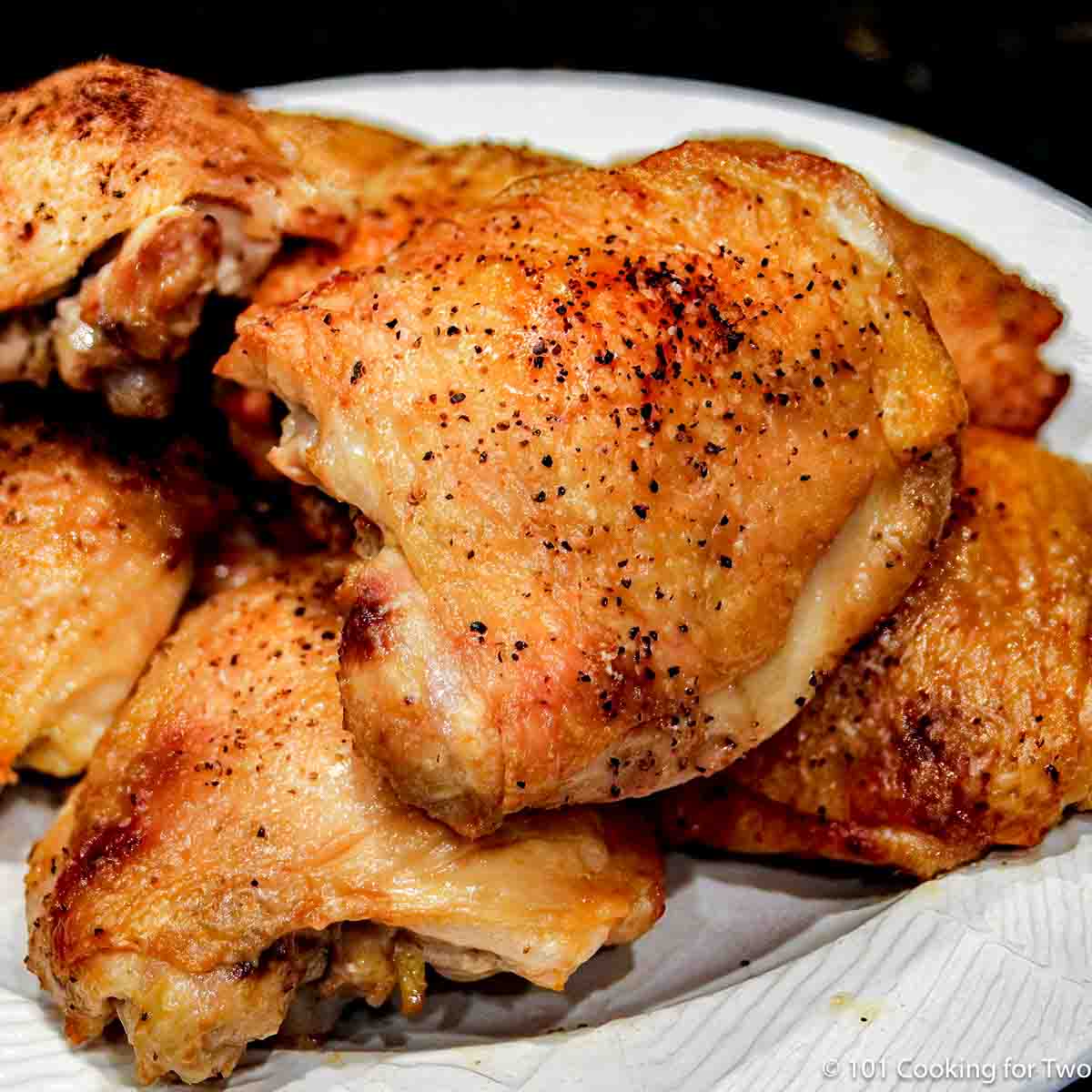 a brown cooked chicken thigh.