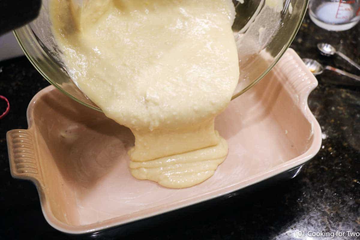 pouring batter into baking dish.