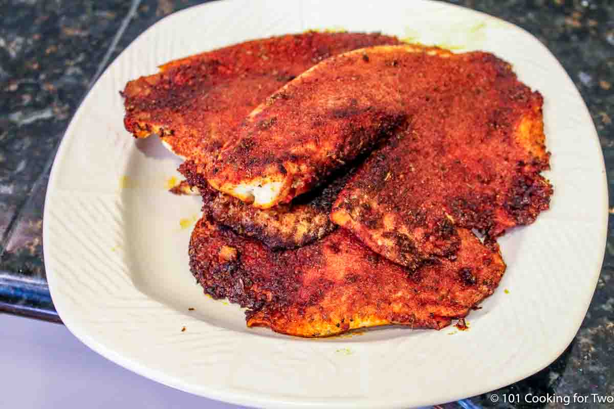 blackened ti;apia on plate.