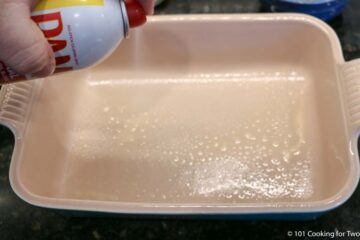 coating a small baking pan with PAM.