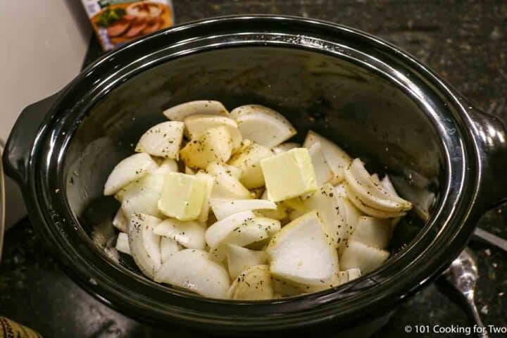 onions and ingredients for carmalized onions in crock pot.