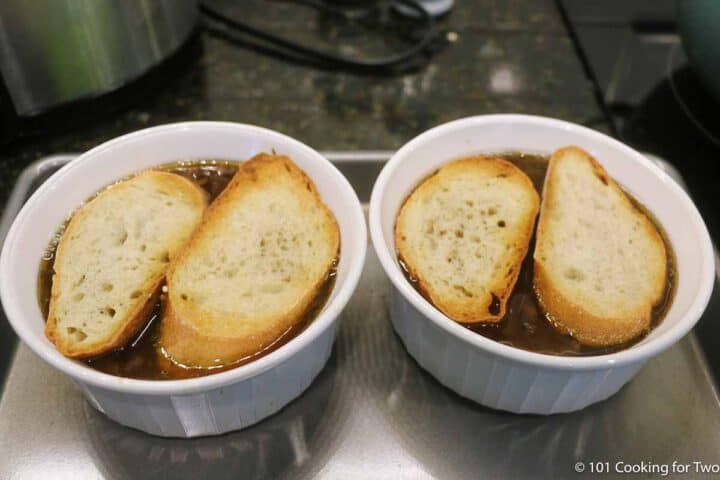 toasted bread on onion soup.