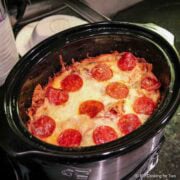 Cooked crock pot pizza with browning.