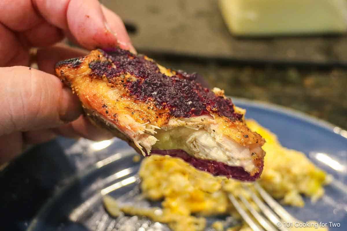 chicken thigh with a bite out of it.