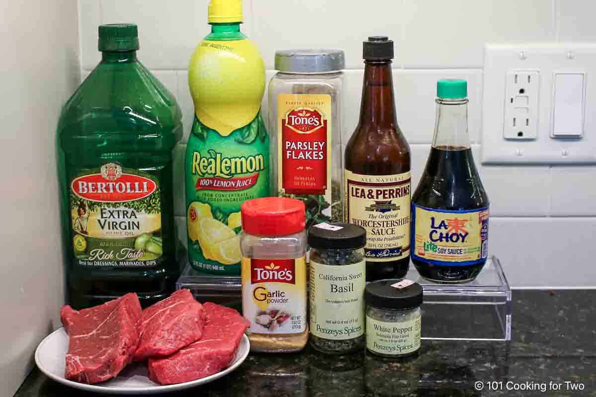 Steak marinade ingredients with sirloin steak.