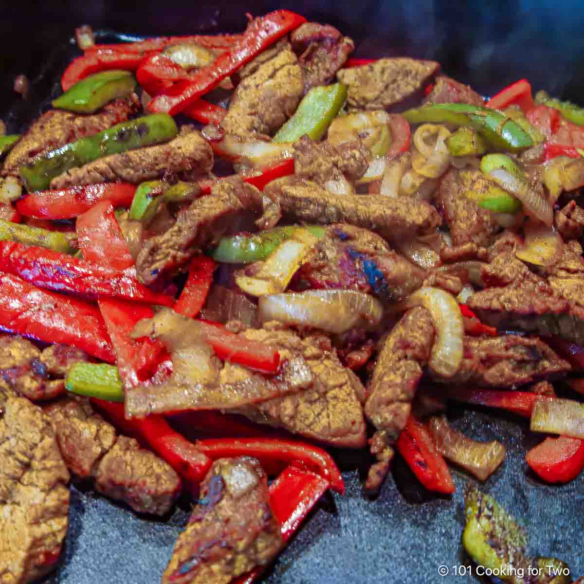 Grilled pork with veggies for fajitas.