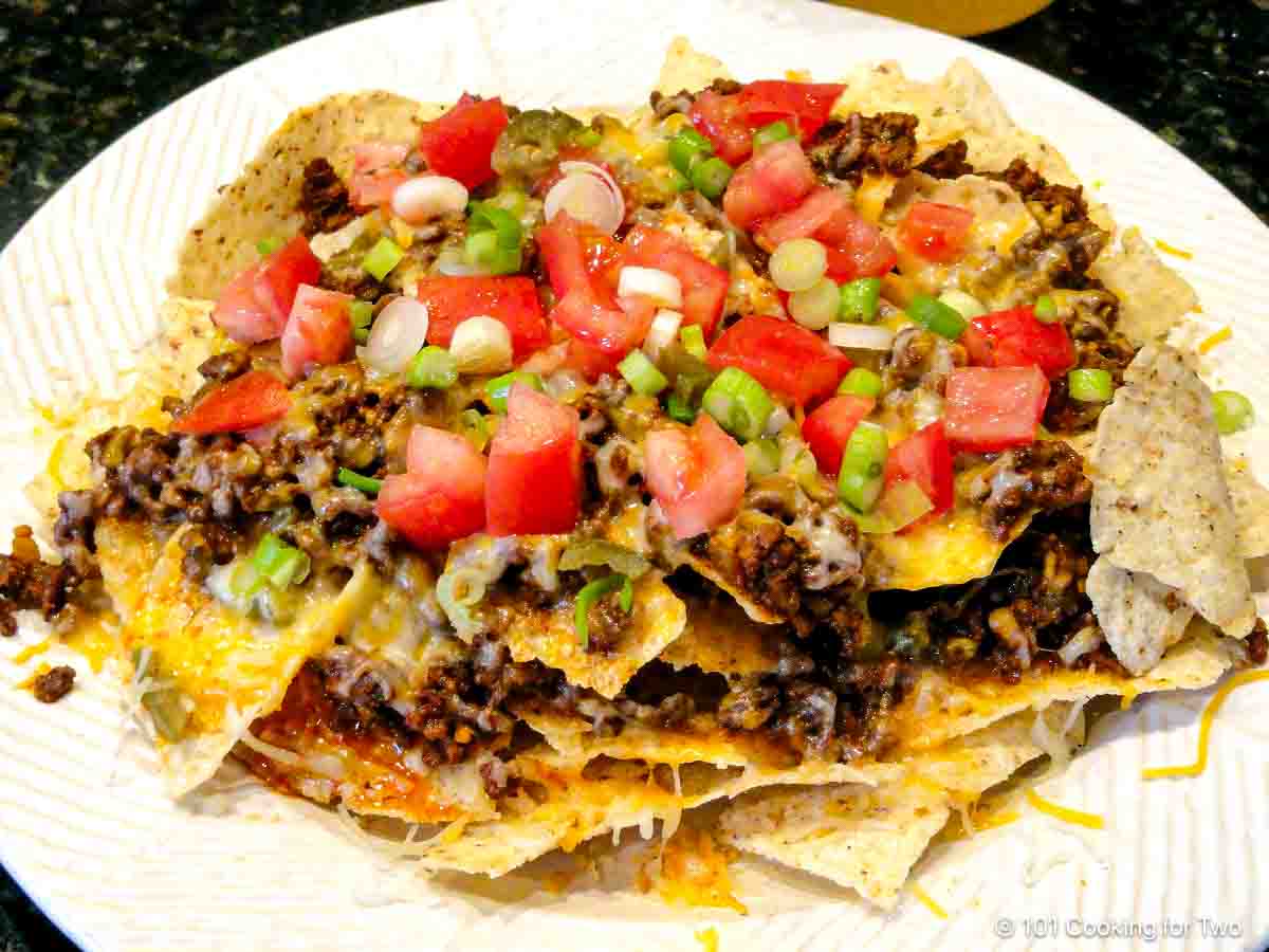 plate of ground beef nachos.