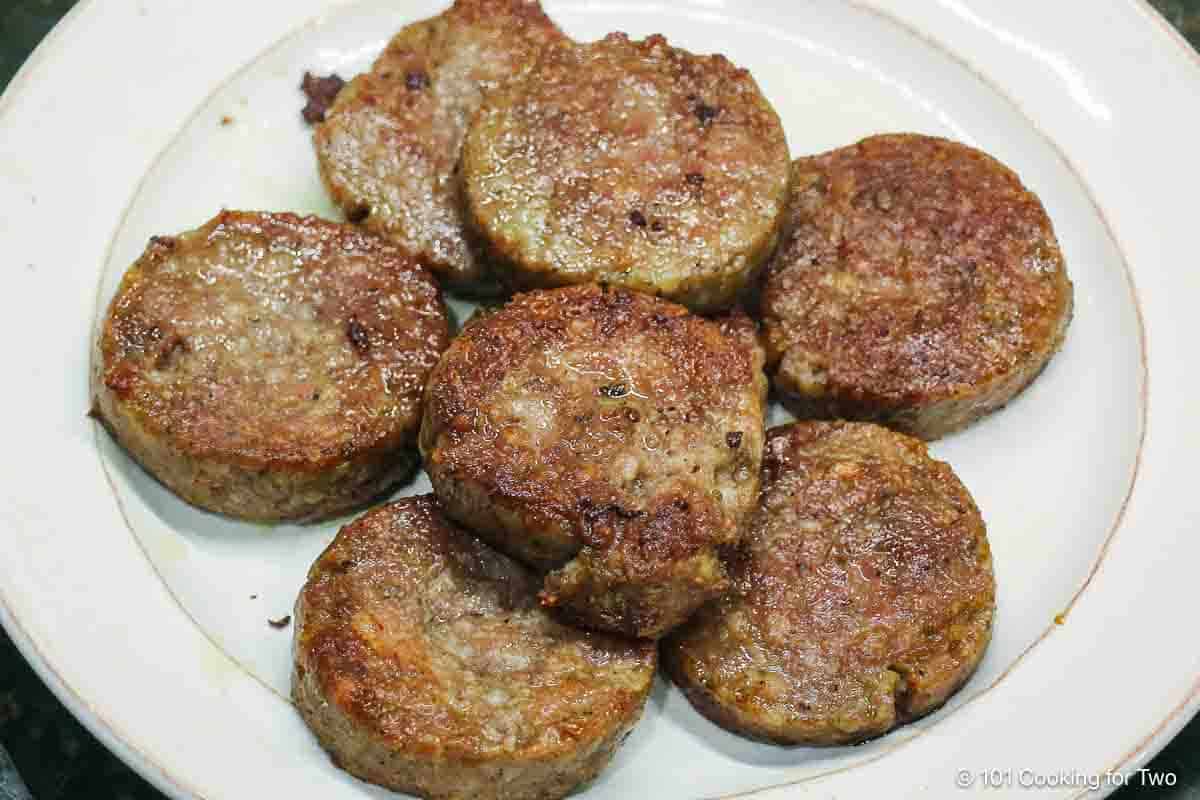 pile of sausage on a plate.