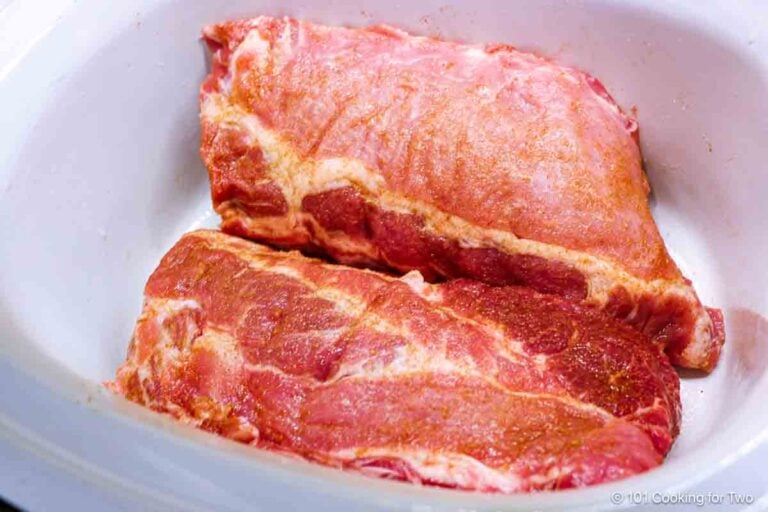 arrange ribs in the crock pot.