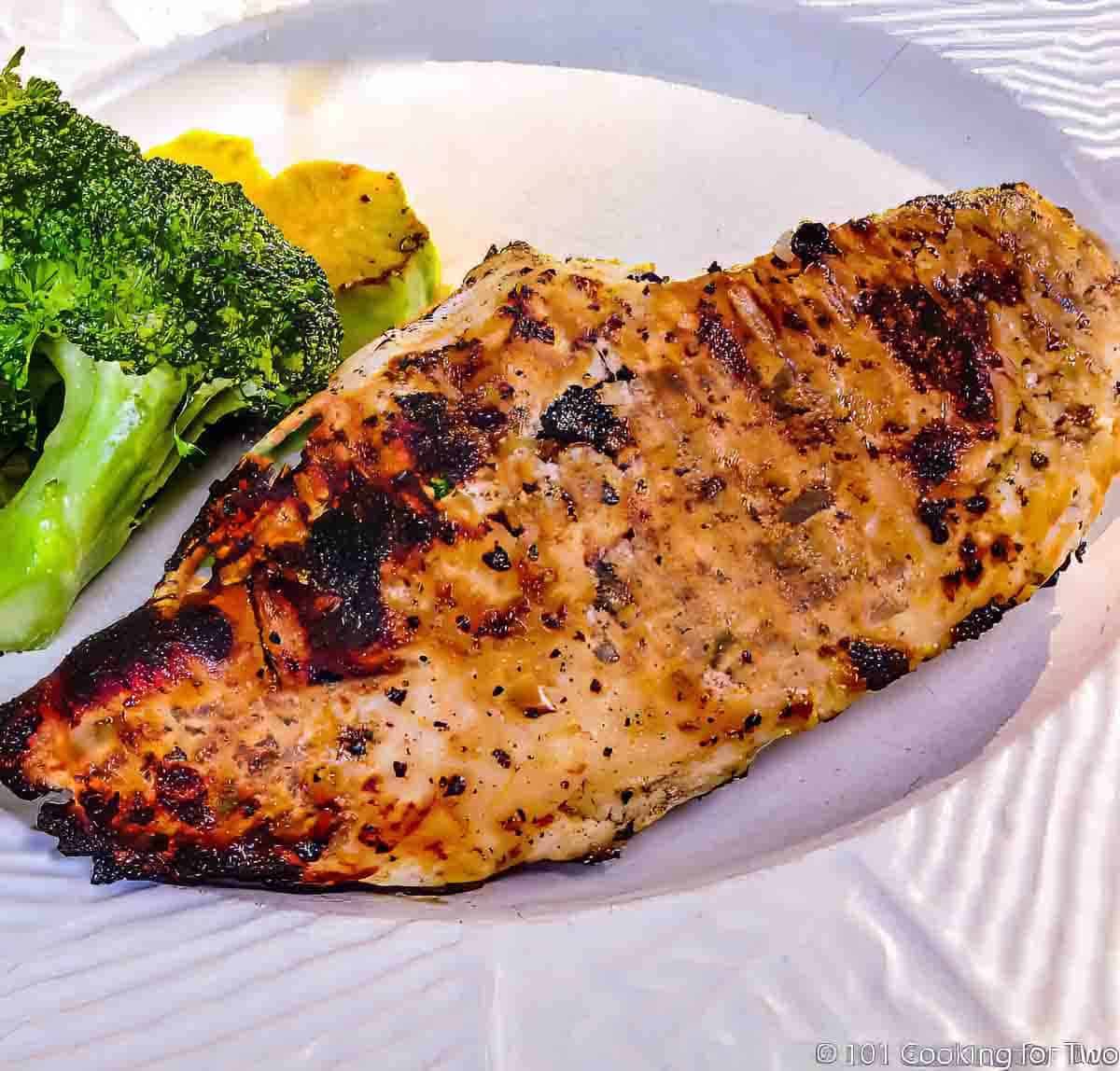 Buttermilk chicken on a white plate.