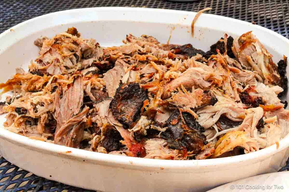 shredded pork butt in a bowl.