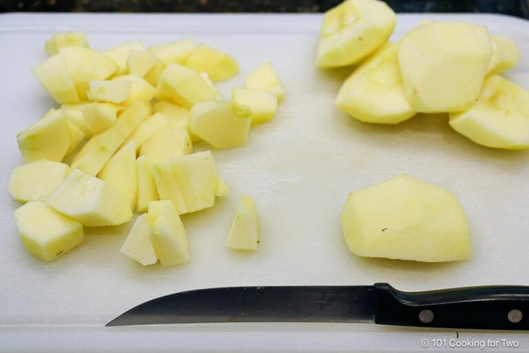 Chopped apples on a whiteboard.
