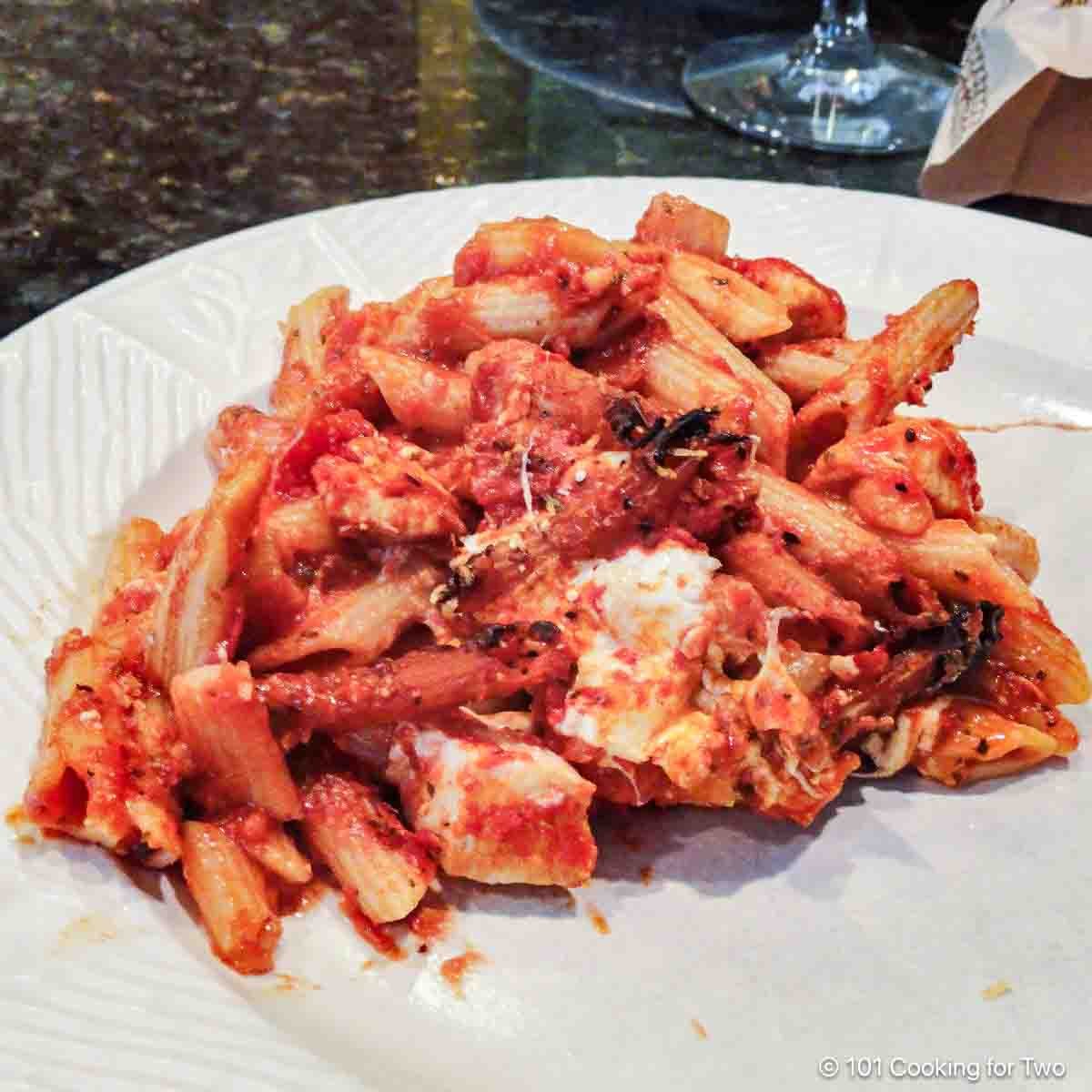 Chicken pasta bake on a plate.