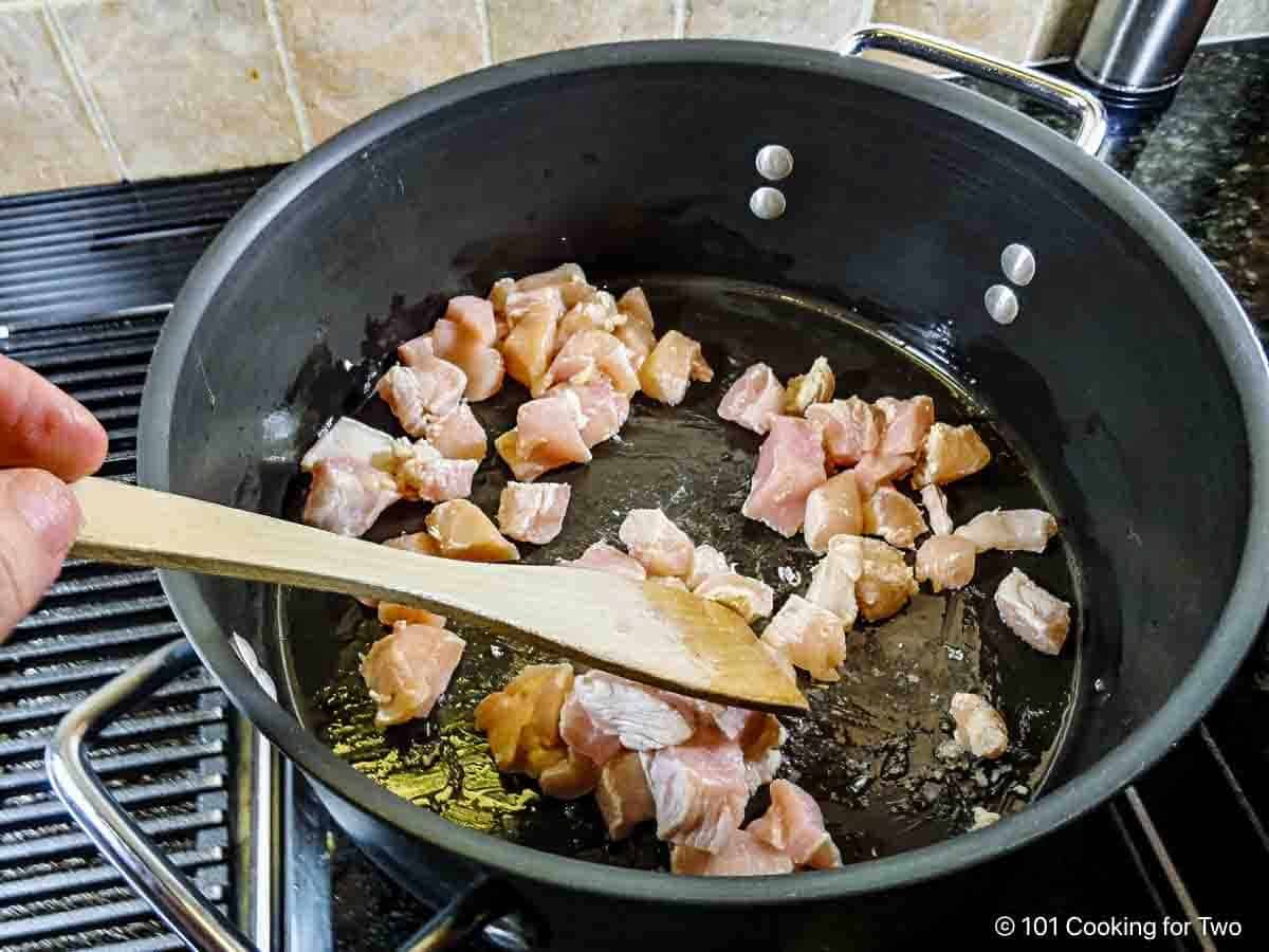 Browning the chicken.