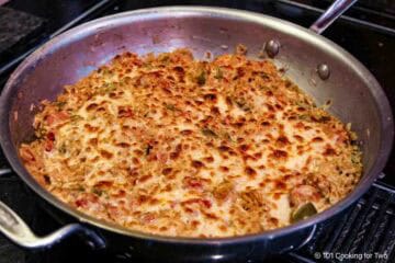Bake the jambalaya to golden brown.