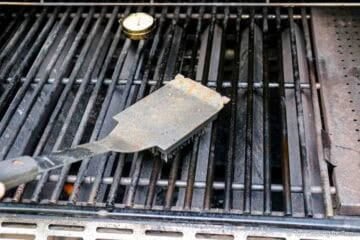 Cleaning grill grates.