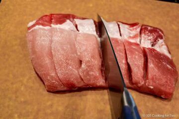 Deepening the rib cuts in the boneless ribs.