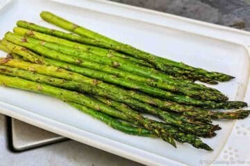 Grilled asparagus on a plate.