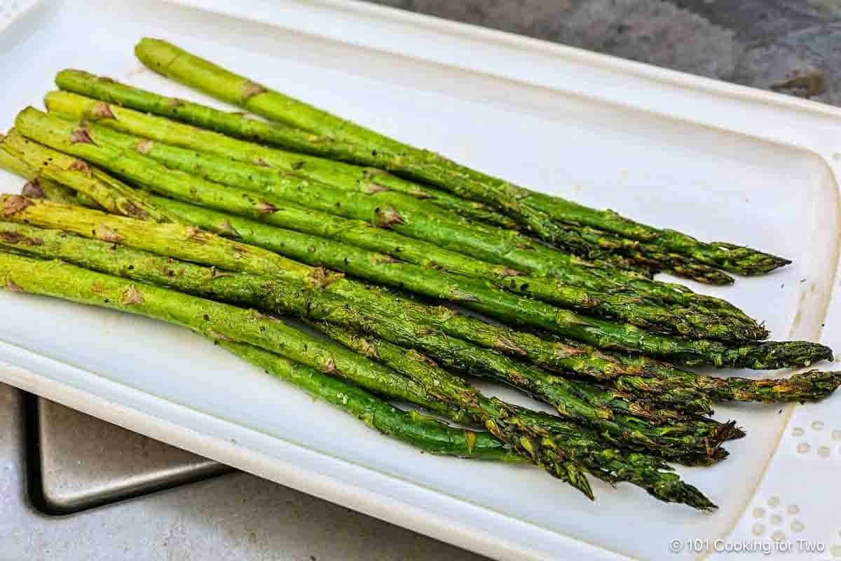 Grilled asparagus on a plate.