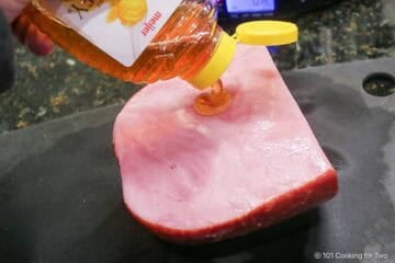Coat the ham with honey.