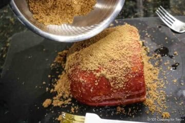 Coat the ham with the brown sugar mixture.