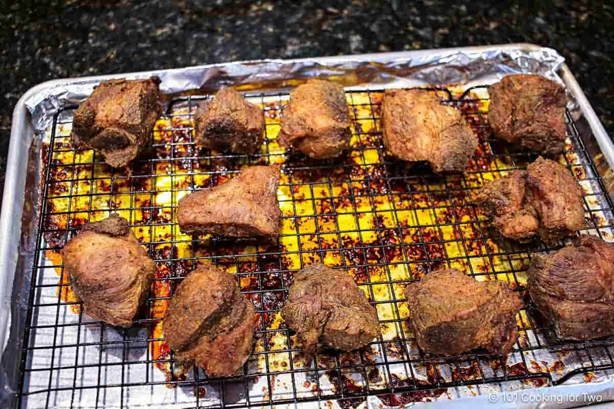 Cooked carnitas on the tray.