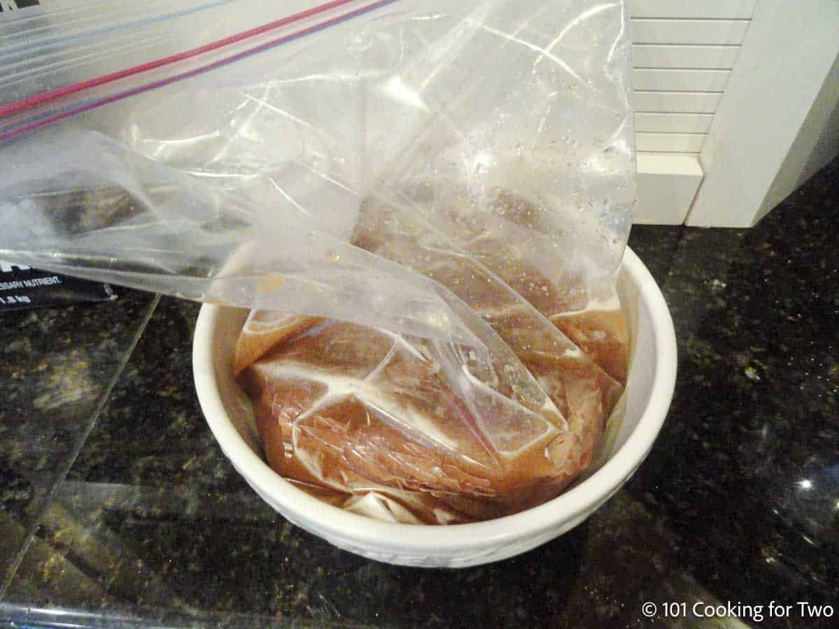 The meat is marinating in a zip lock.