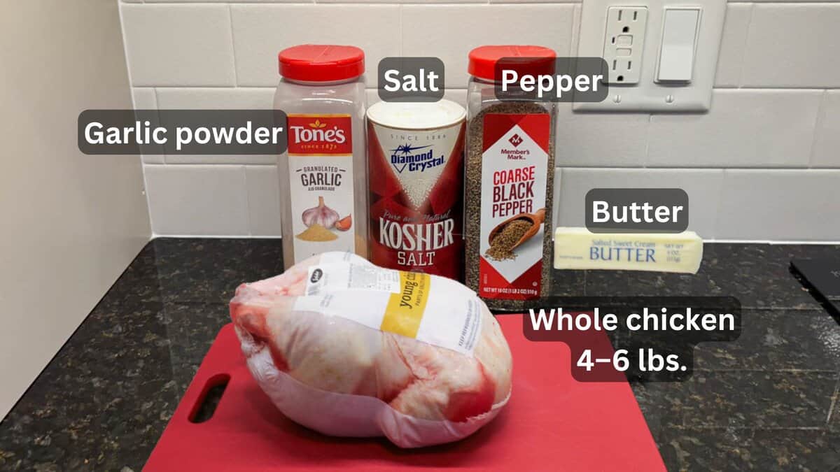 Whole chicken with seasoning and butter—labeled.