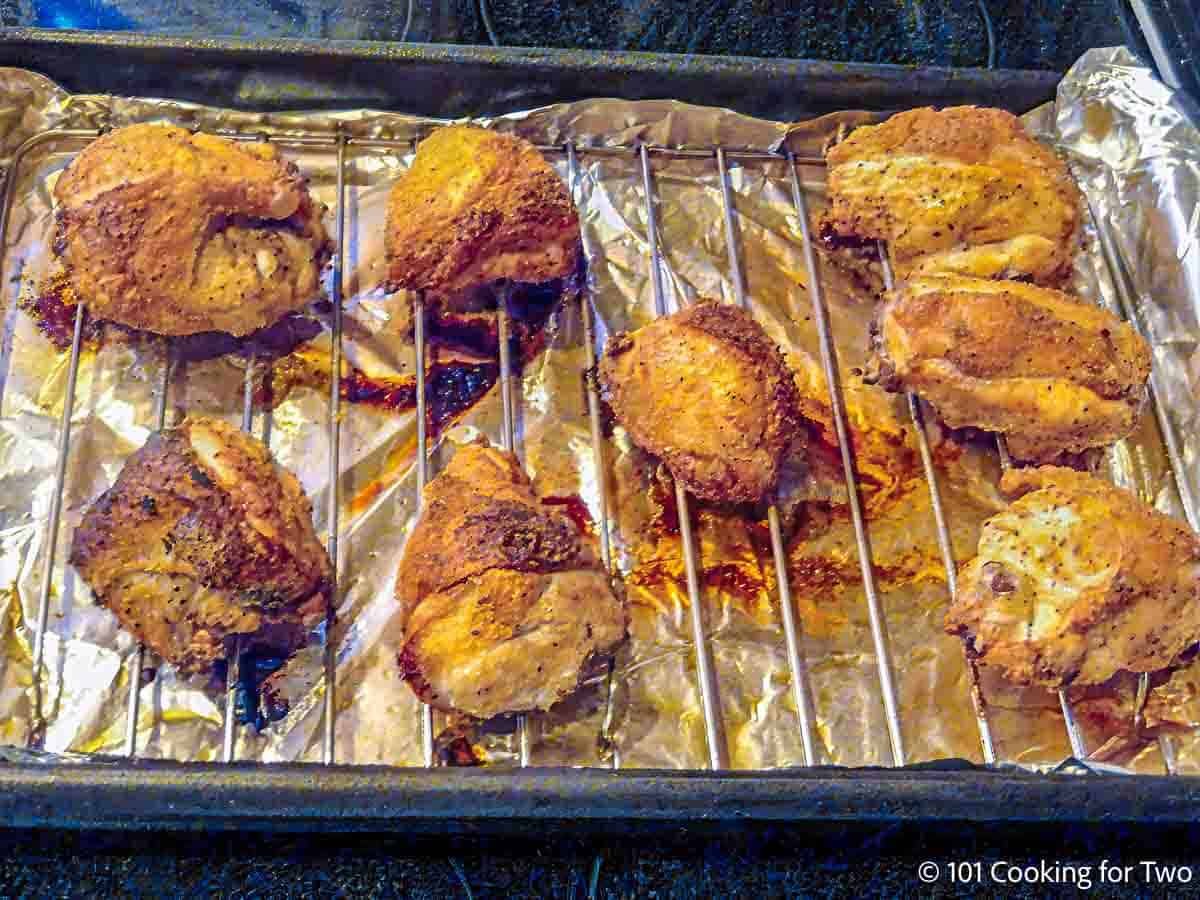 Cooked chicken on the tray.