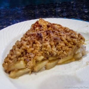 Slice of apple crumble pie.